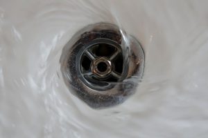 Fixed kitchen sink and drain
